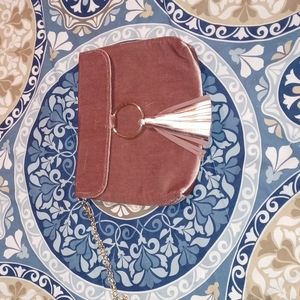 Pink suede clutch with wrist chain